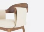 High-end wooden dining chair with cream upholstery
