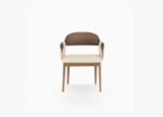 Designer dining chair with sculpted wood back