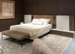 Alfa Modular Bed with built-in reading lights integrated into wood panel headboard